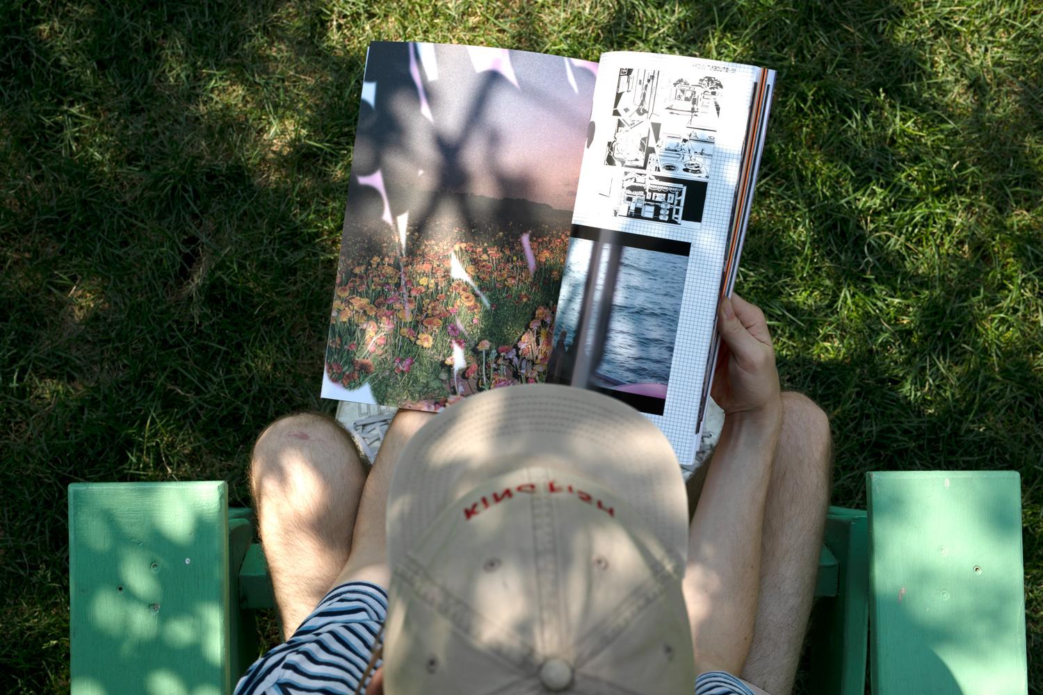 Student reading the MCAD Viewbook